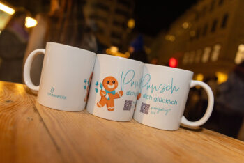 Drei Punschheferl mit SPiNNWERK branding