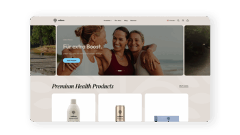 Screenshot einer Website f&uuml;r Gesundheitsprodukte mit drei l&auml;chelnden Frauen, die sich im Freien umarmen, einem 